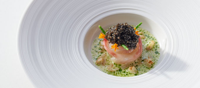 A close-up of a signature dish from Restaurant Haerlin***.