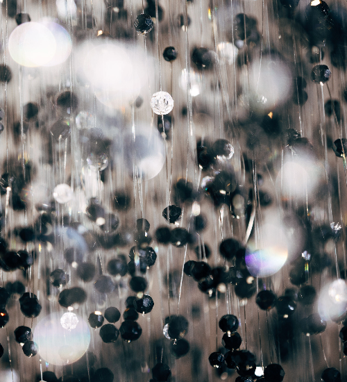 View through the black crystals of the chandelier in the Haerlin restaurant***
